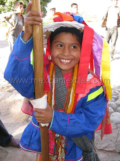 1malinche_cora.JPG - You can't believe how hard it was to get this smile. She is one of the two "malinches" during the Pachitas ceremony.