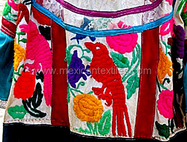 mazateca_ayutla__10.jpg - Details of the birdss and flowers on the front of the huipil.