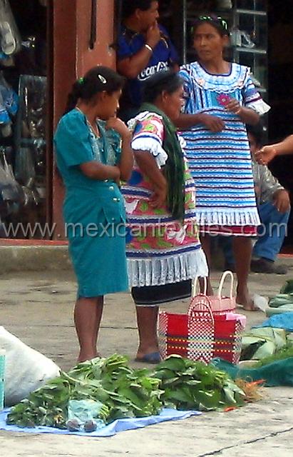 jalapa_mazateca__24.jpg - Huipils in this picture ar eprobably from two different towns. The blue on the right from Jalapa and the embroidered on the left from ixcatlan.