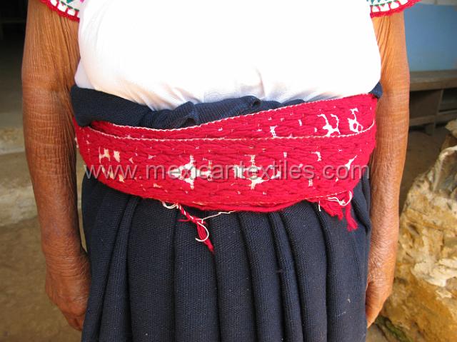 nahuatl_hueytentan_15.JPG - Ascencia Galindo Barbecho in her traditional costume with a close up of how the belt is used.