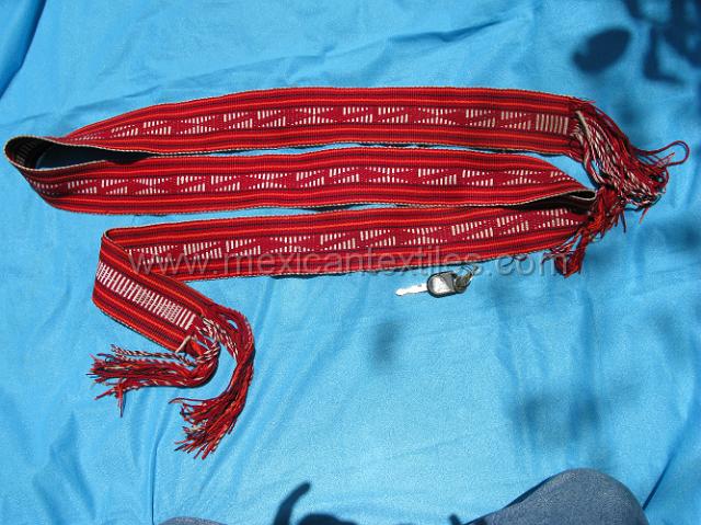 belt_tlaquimpa_02.JPG - THe more traditional red belt with designs similar to the Totonacan belts worn throughout the Sierra Norte of Puebla. The width is much less than the Totonacan belts.