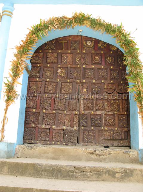 cburch_carved_door.JPG - The church doors, does any one get that I liked them.