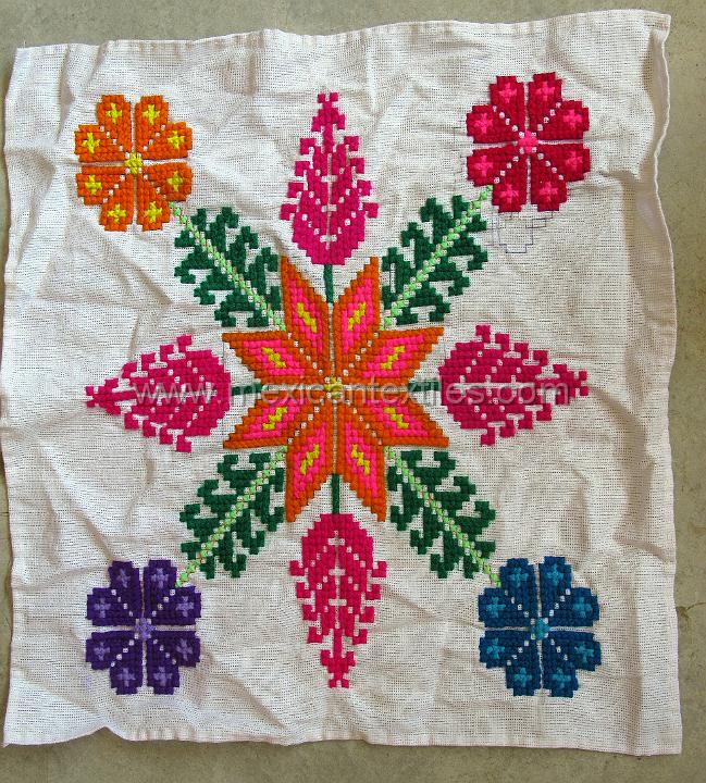 sn_antonio_embroiderey_12.JPG - Otomi indian embroidery from San Antonio Huehuetla, Hidalgo, naphin Otomi star with corn and floral pattern.