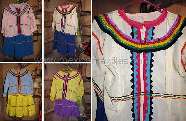 cora_costume.jpg - Textiles for sale in Jesus Maria , show the distinctive applique of the Cora dress from this region.
