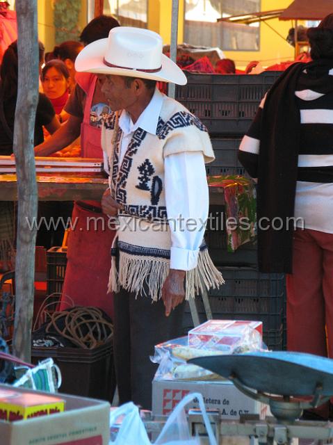 nahua_cuautempan_15.JPG - wool poncho worn by local man.