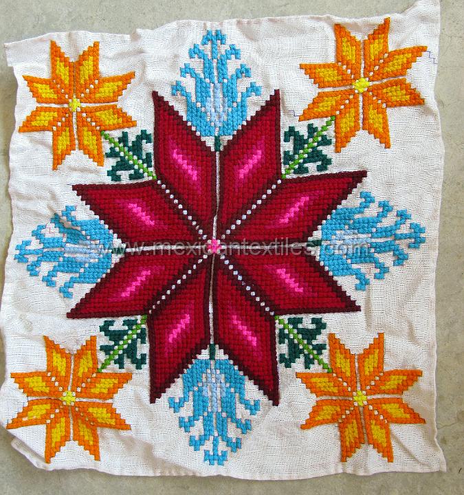 sn_antonio_embroiderey_11.JPG - Otomi indian embroidery from San Antonio Huehuetla, Hidalgo, naphin Otomi star with corn and floral pattern.